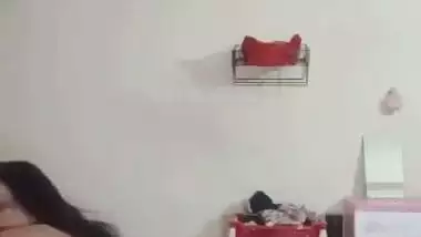 Big boob nude girl shows her butt and squeezes her boobs