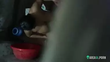 Spy video of village aunty taking bath in outdoor taken by her son's best friend